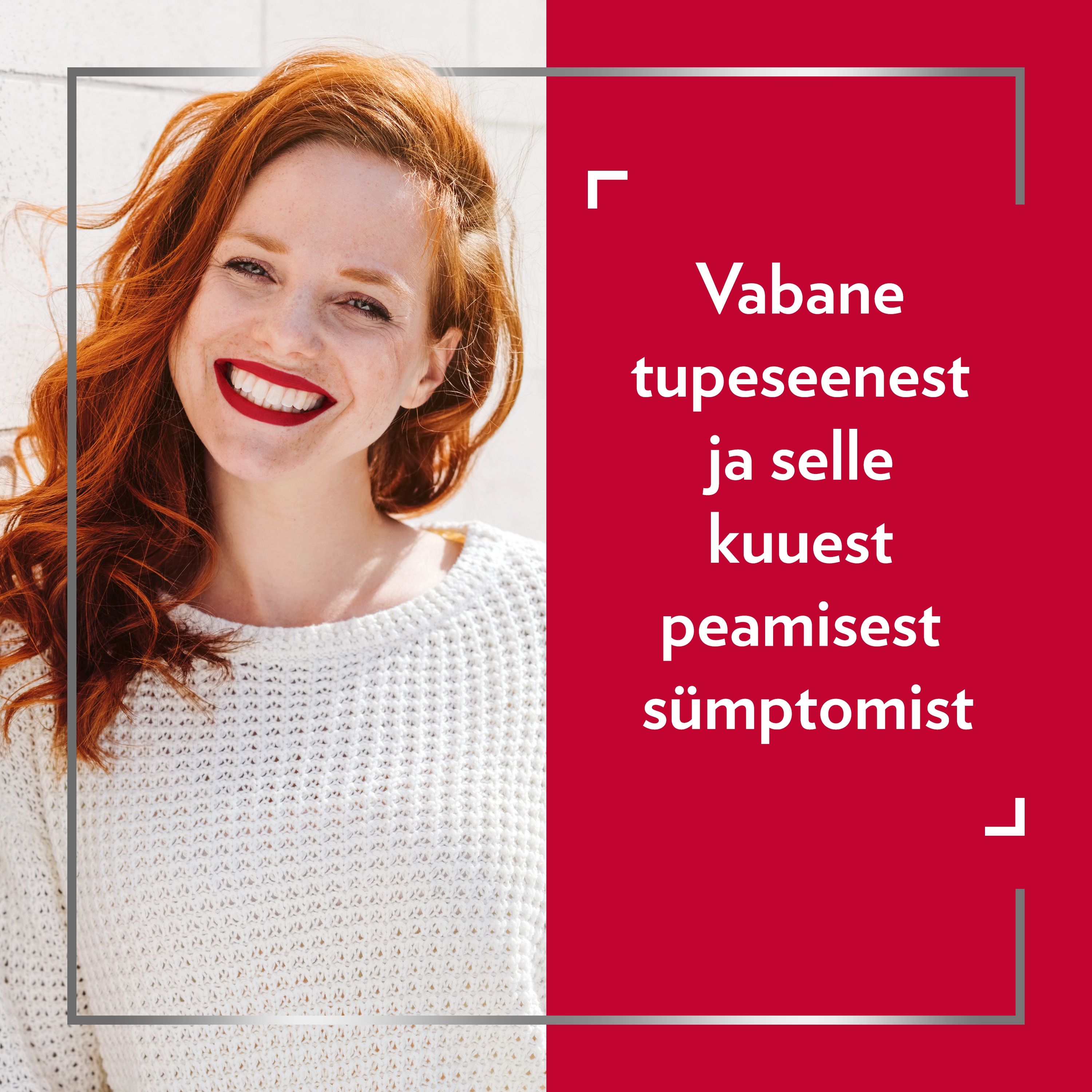 Naeratav punapäine naine.